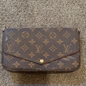 Louis Vuitton Monogram Clutch in Brown
